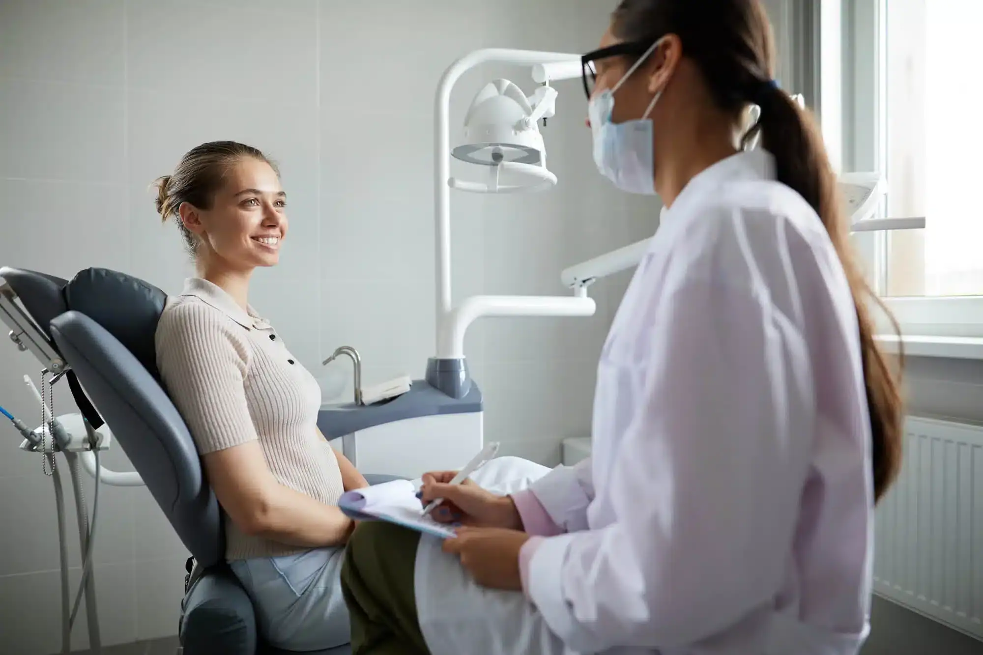 Female-patient-smiling-at-a-cosmetic-dentist-in-Riverview-MI