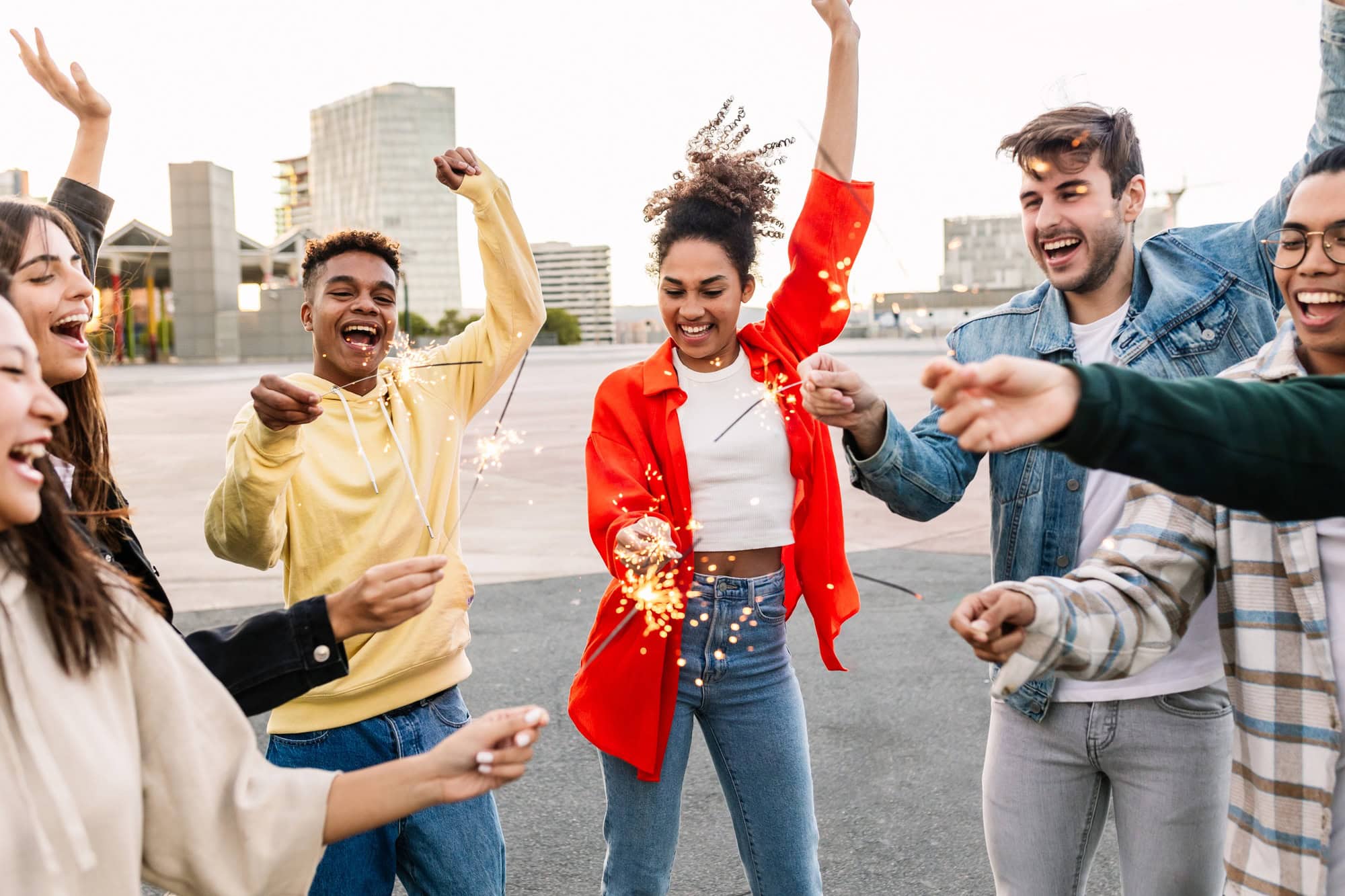 Happy young group of people having fun together on party