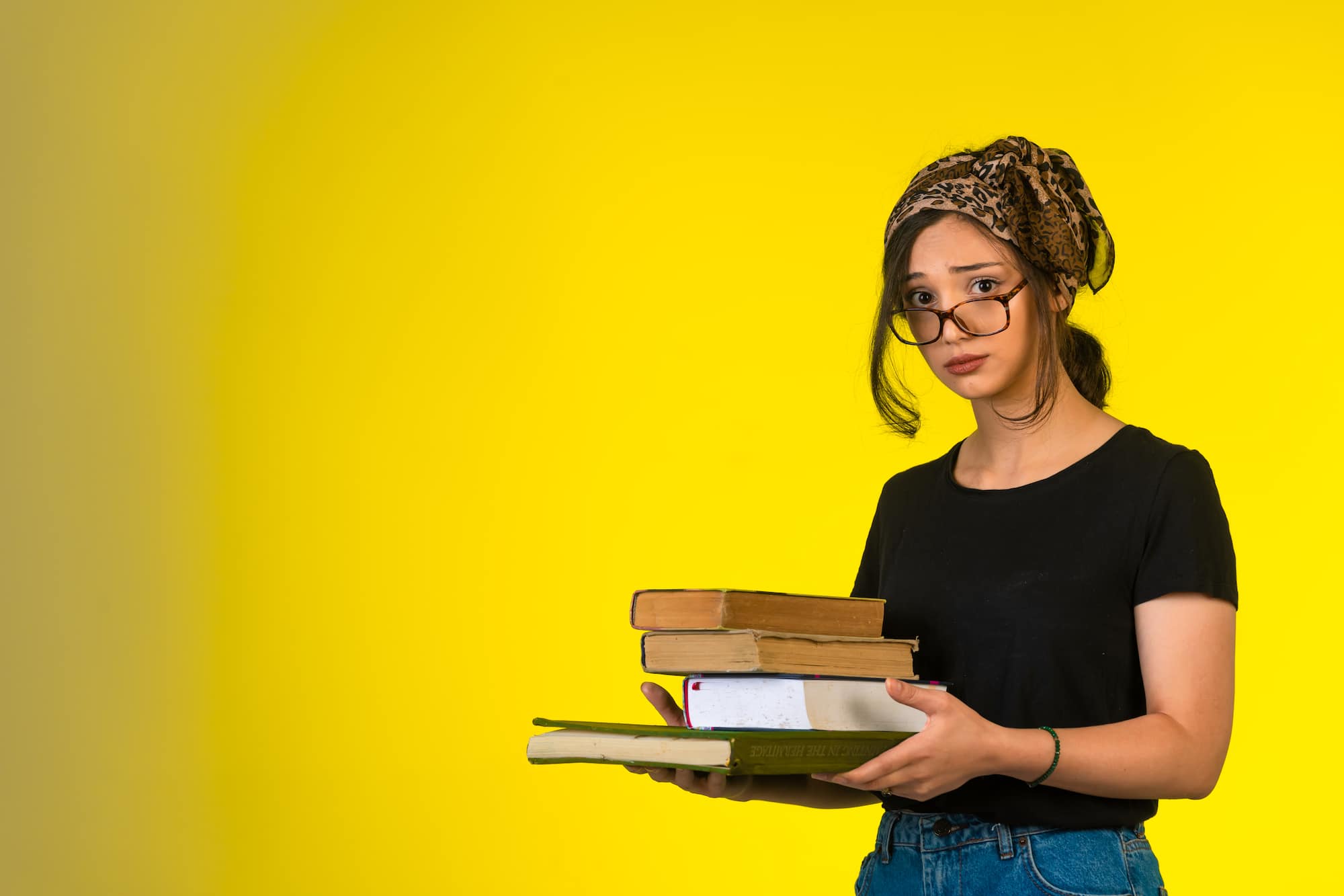 Designer reviewing a print-ready PDF with bleed lines, safe zones, and 300 DPI artwork prepared for professional printing