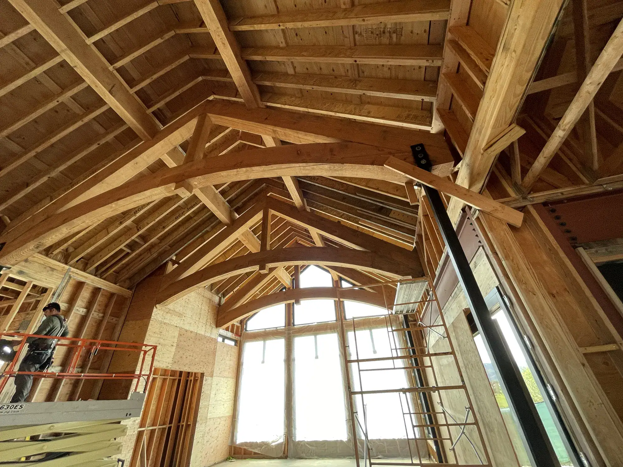 Curved-chord timber trusses in a framed great room