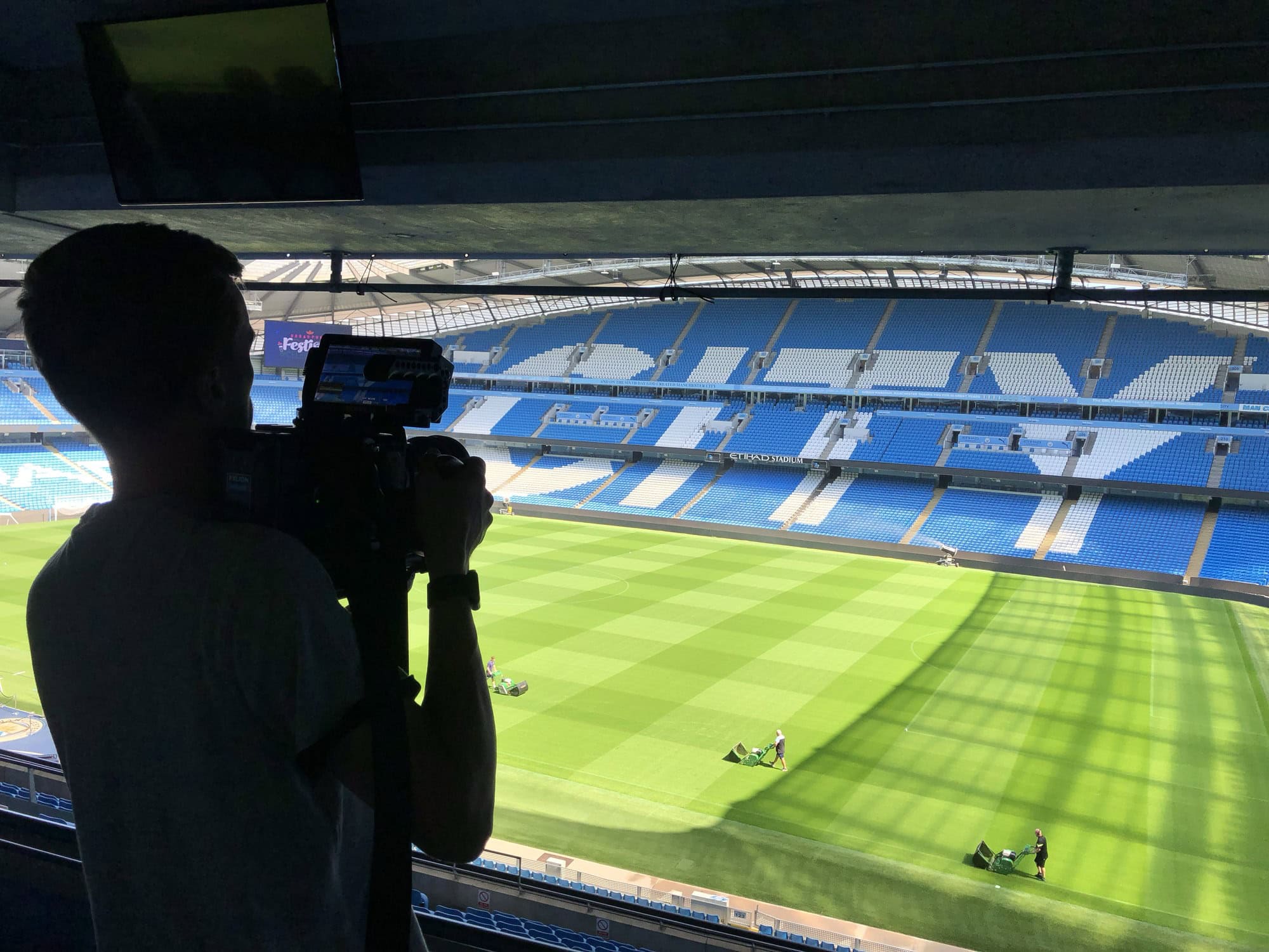 Aposs operator filming from the stands at a Premier League stadium in Manchester