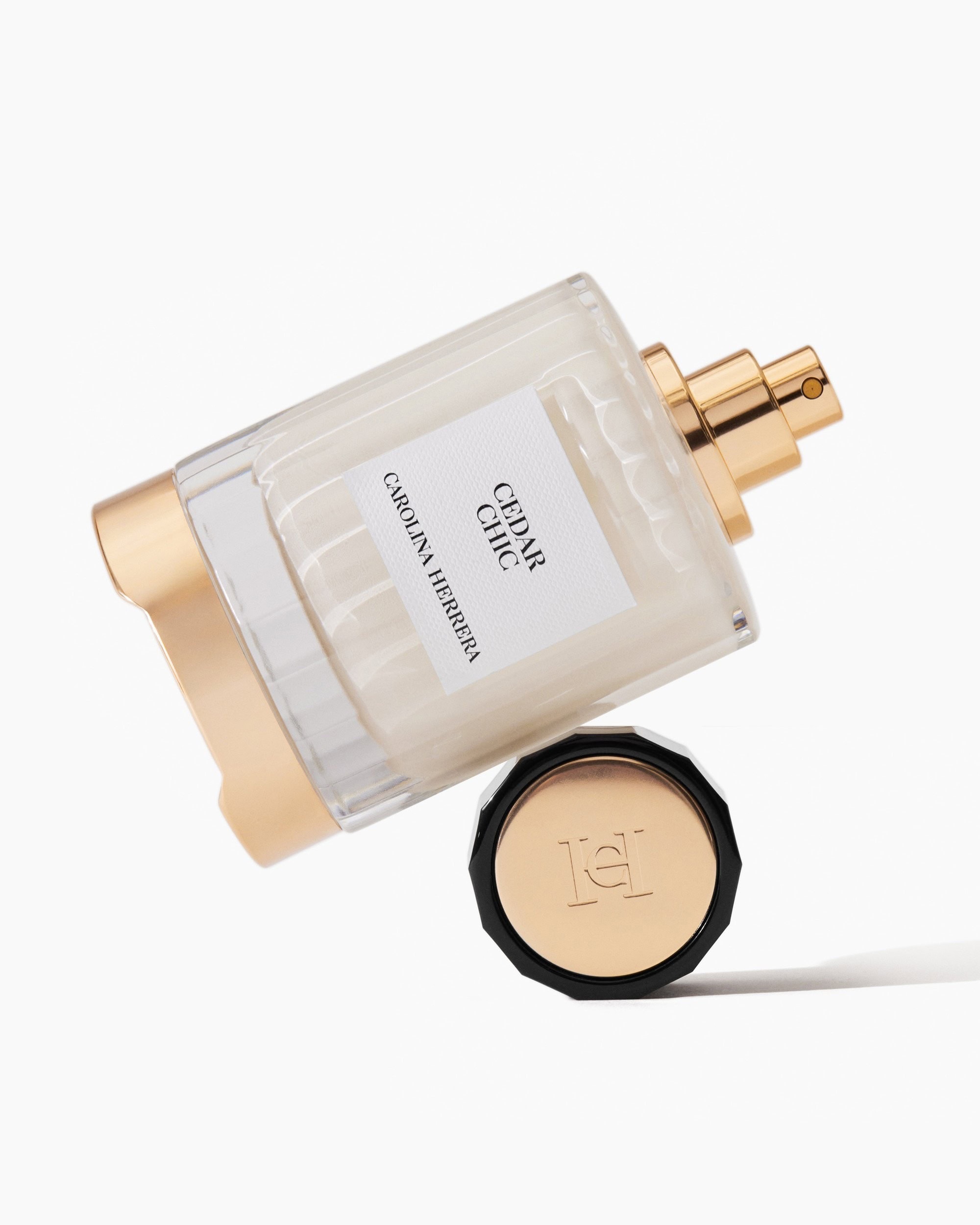 Carolina Herrera Cedar Chic fragrance, a woody floral Eau de Parfum featuring cedarwood, orange blossom, bergamot, and white musk.