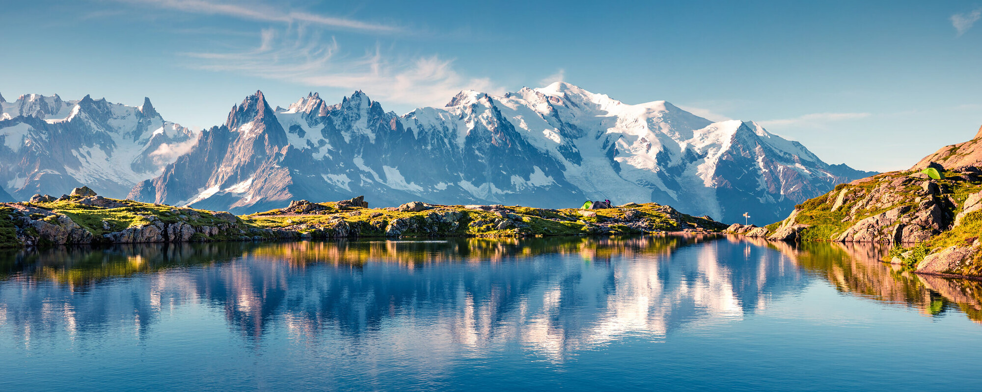 Mont Blanc and the Chamonix Aiguilles reflected in an alpine lake