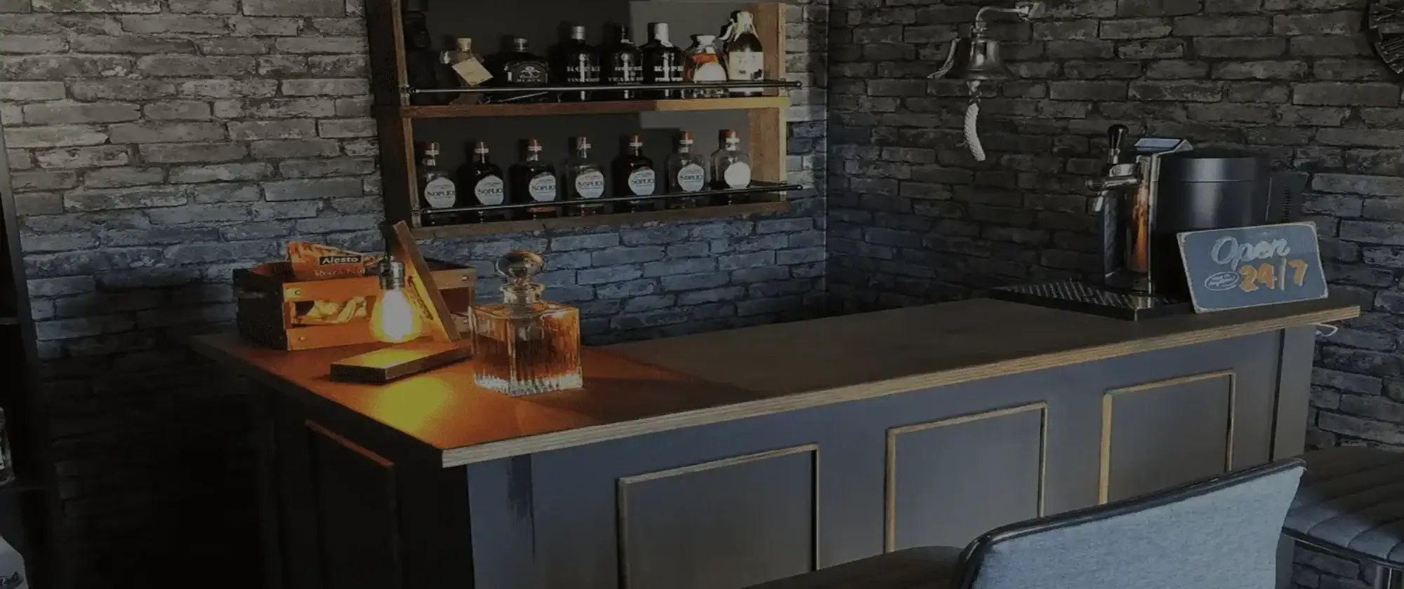 UK home bar with stone wall behind