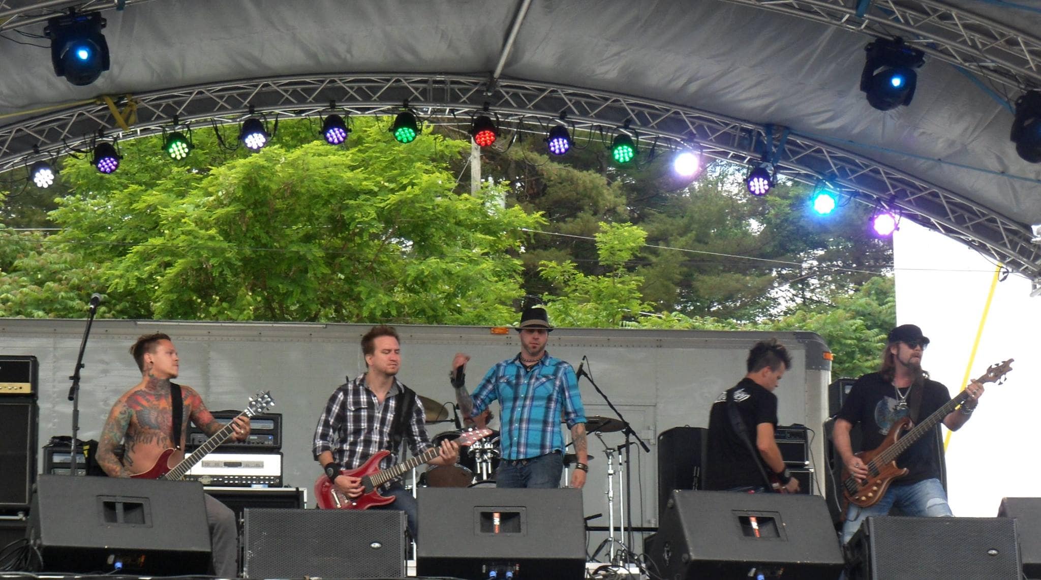 Performing at Laconia Fest, Pulse, the Hard Hitting Rock Band from Dallas/Fort Worth Texas. Featuring (L-R) Steven Tyler Carrell (Guitar), James Brennaman (Guitar) Eric Fox - Obscured (Drums) Sean Yeaney (Vocals) Jiggy Judy (Guitar) Michael Hayes (Bass)