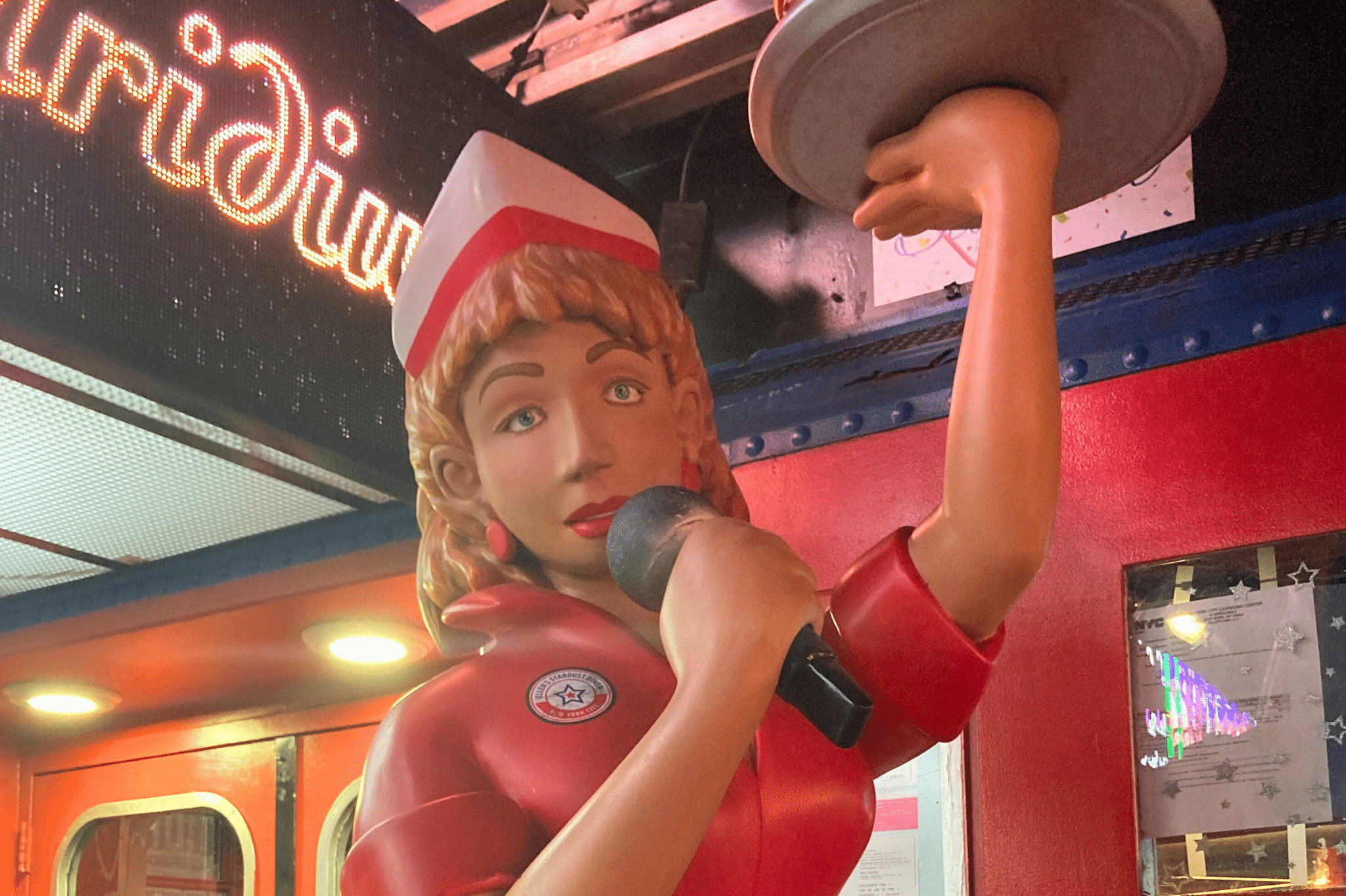 In Front of Ellen's stardust diner a kid friendly restaurant in New York City