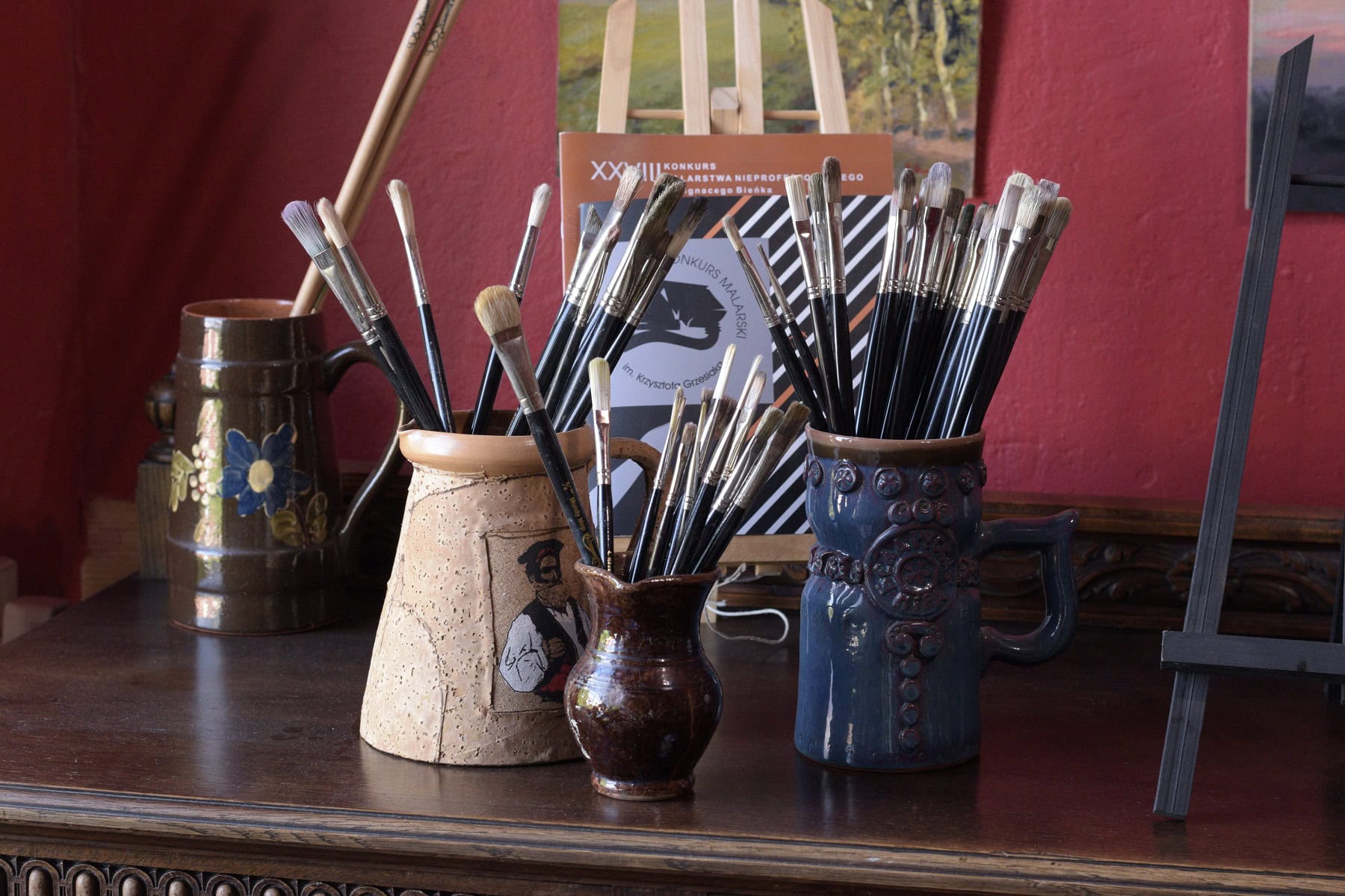 Working collection of Rosemary and Co oil painting brushes in an artist studio