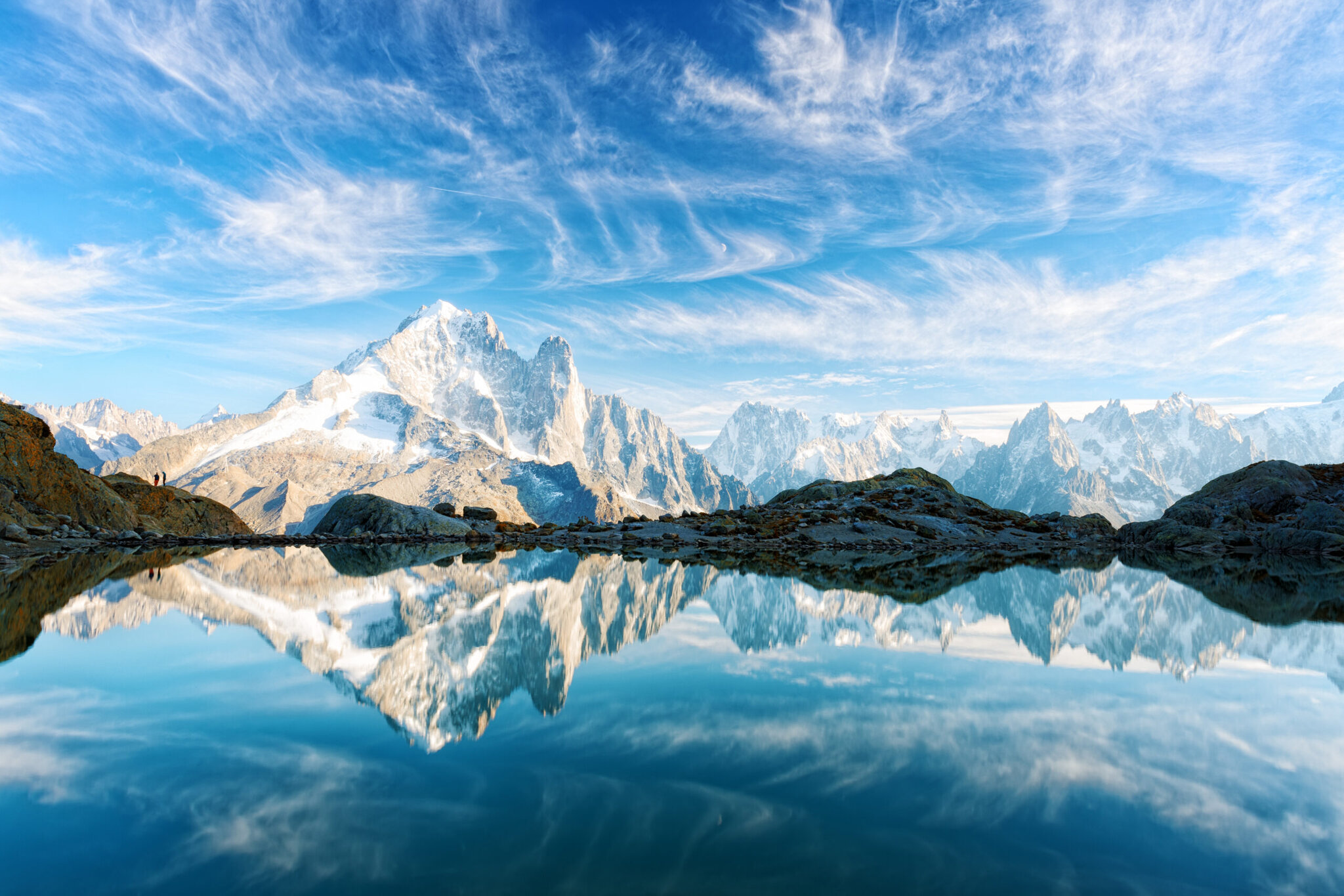 Mont Blanc massif reflected in an alpine lake above Chamonix