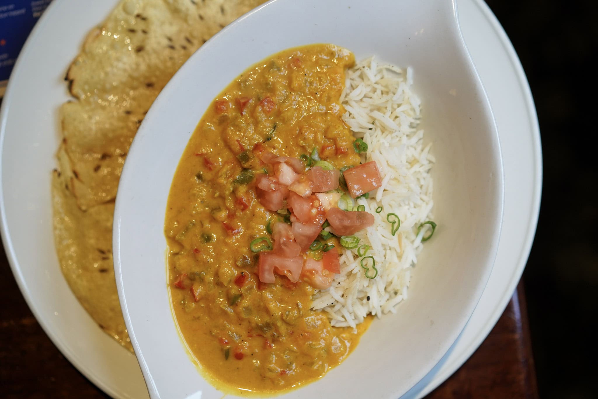 Vegan coconut curry from The Morrissey House, featuring a rich blend of coconut milk, fresh vegetables, and aromatic spices.