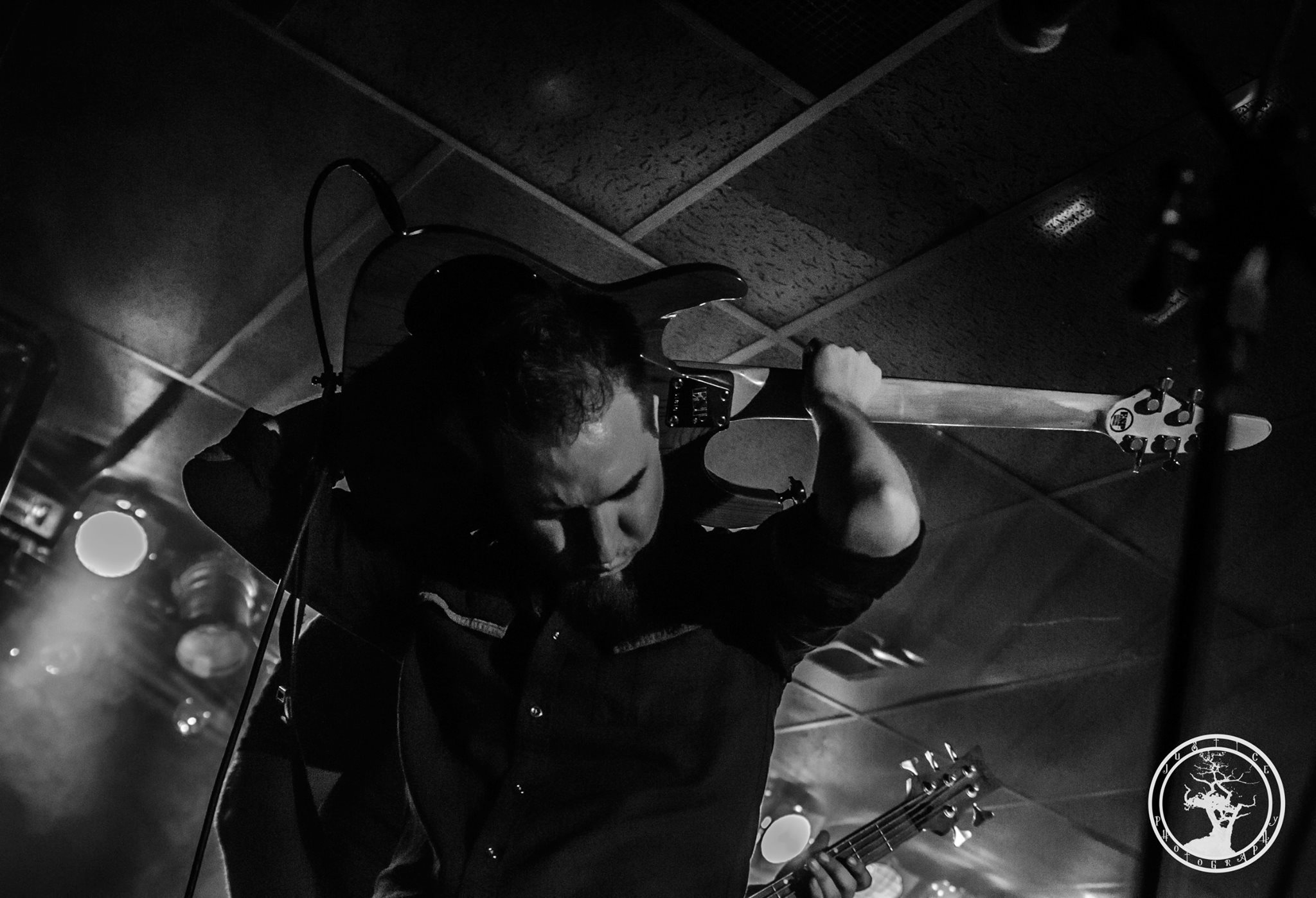 James Brennaman Plays Guitar Behind his Head during a Guitar Solo in Kansas City at Collapsefest circa August 2014