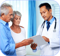 Doctor talking to a pair of elderly patients