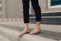 Pedestrian about to jaywalk in illegally in California