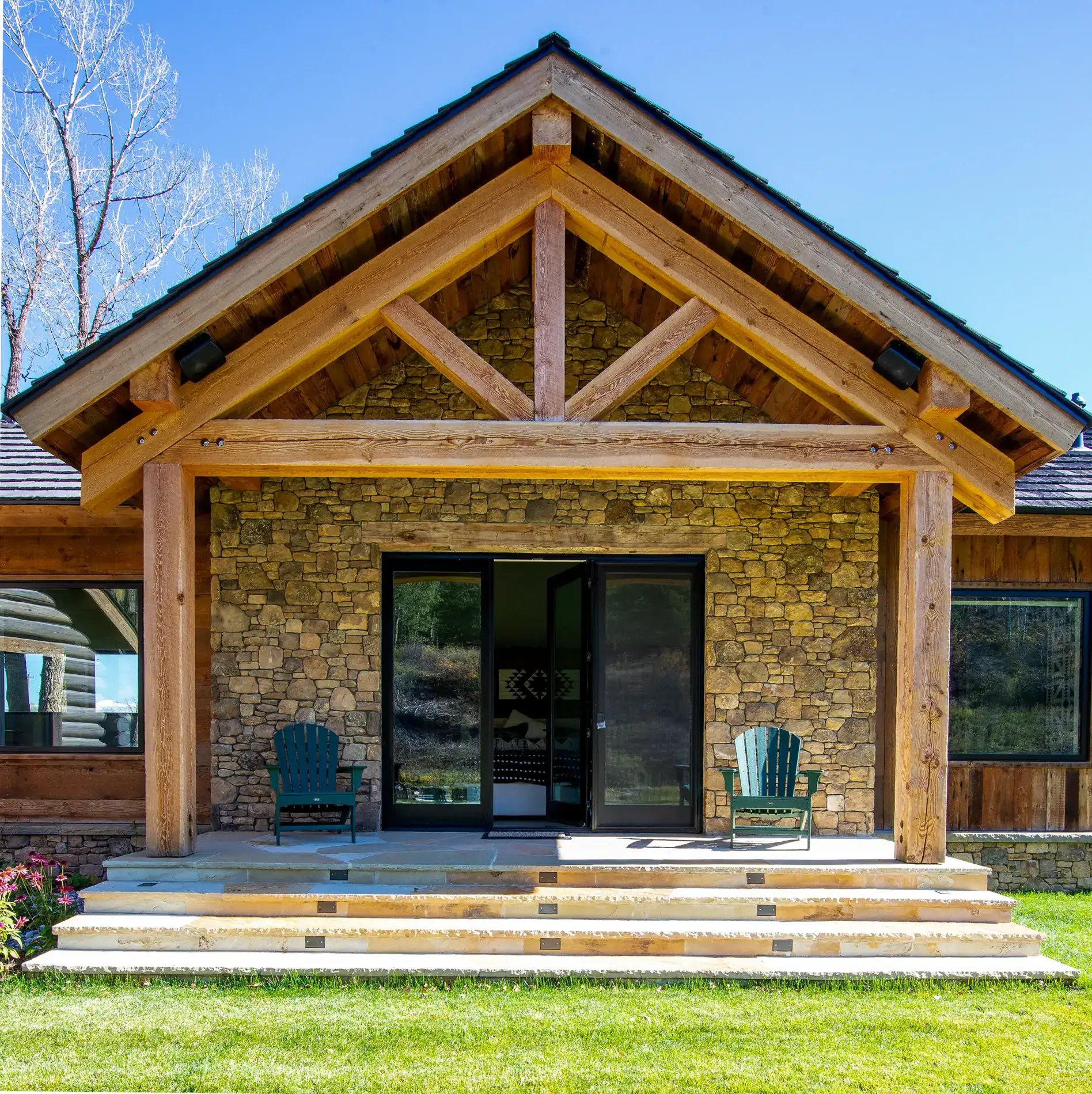 Sawn timber entry gable truss at a finished residence
