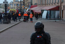 Investigators and members of emergency services work at the site of an explosion in a cafe in Saint Petersburg (Photo: Reuters)