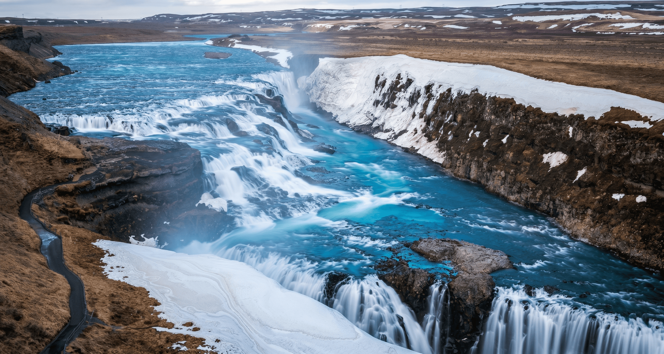 Come Visit Iceland – Gullfoss waterfall in Iceland cascading into a rugged canyon