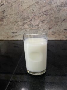 A glass tumbler filled with the drink