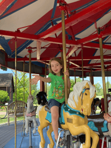 Little boy enjoying a theme park