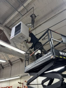 Metrowest plumber servicing a unit heater in Vancouver, BC