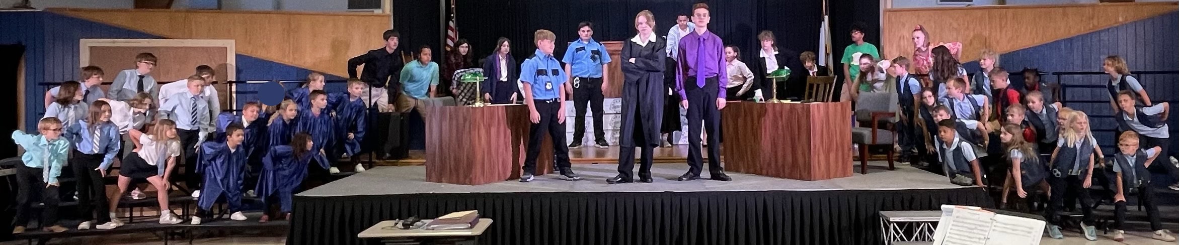 Students performing Order in the Court, an original spring musical at Martin Luther School Joplin