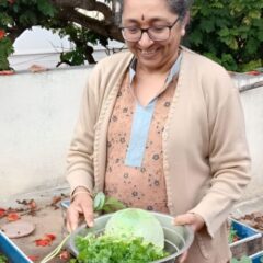 woman with coriander and cabbage