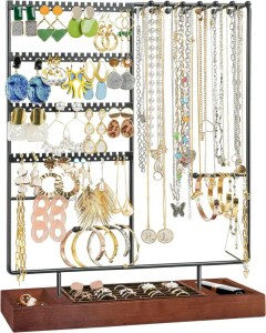 Brightly organized jewelry display featuring necklaces, earrings, rings, and bracelets on a stylish stand, perfect for displaying and organizing accessories for a fashionable look.