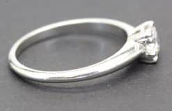 Engagement ring with a sparkling diamond set in a silver band, crafted by Weldons Jewellers.