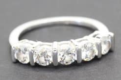 Stunning diamond eternity ring with sparkling stones in a silver band.