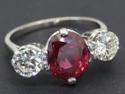 Ruby and diamond three stone