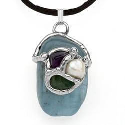 Law of Attraction Pendant, a silver-toned necklace with a colorful, intricate dolphin design featuring gemstones and pearls