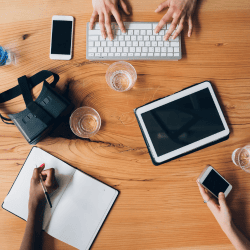 Image of lots of pieces of technology and electronics which can impact a directors duties