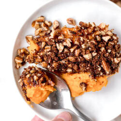 close up of paleo sweet potato casserole on a small round white plate