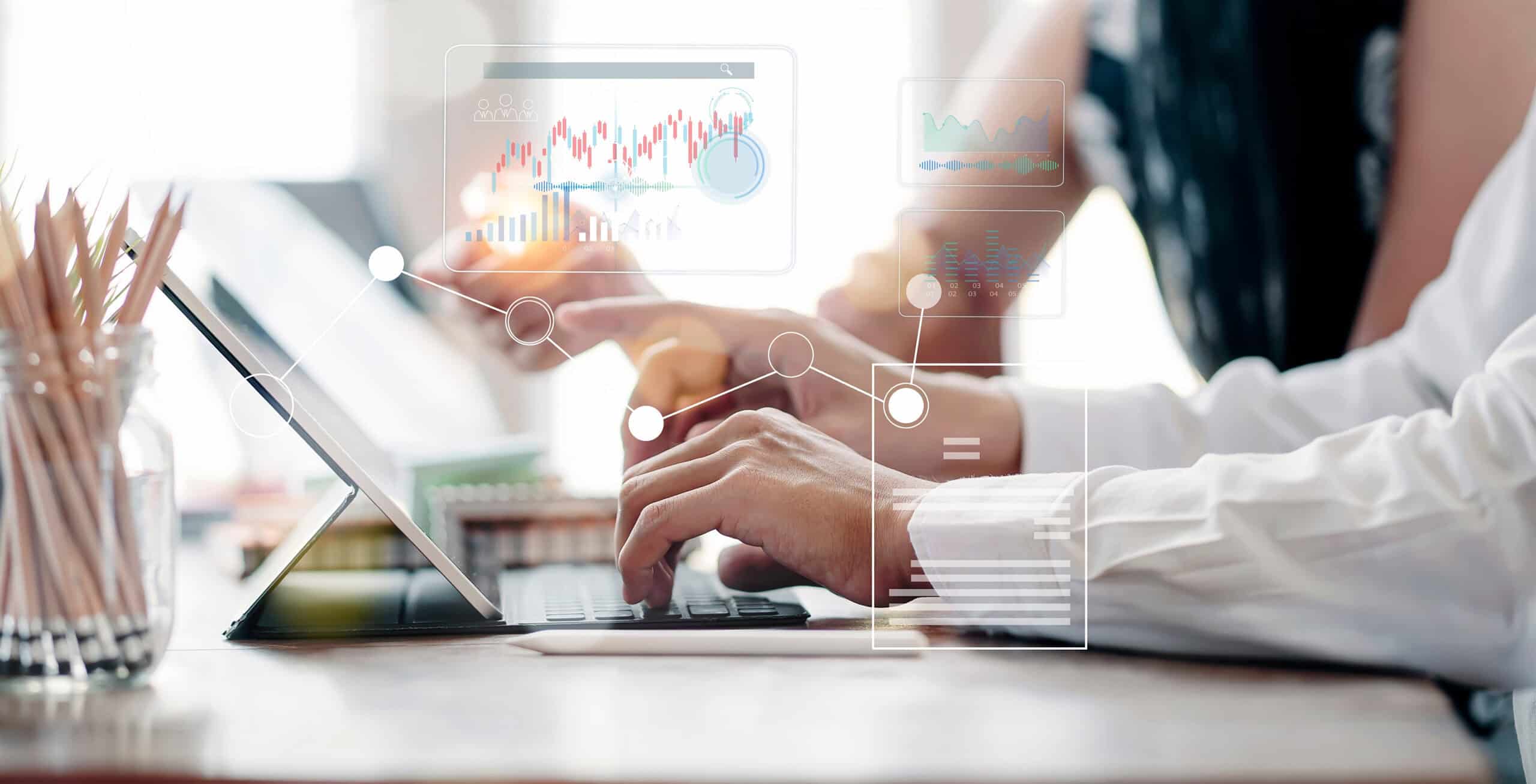 Boss and employee reviewing grants with grant management software
