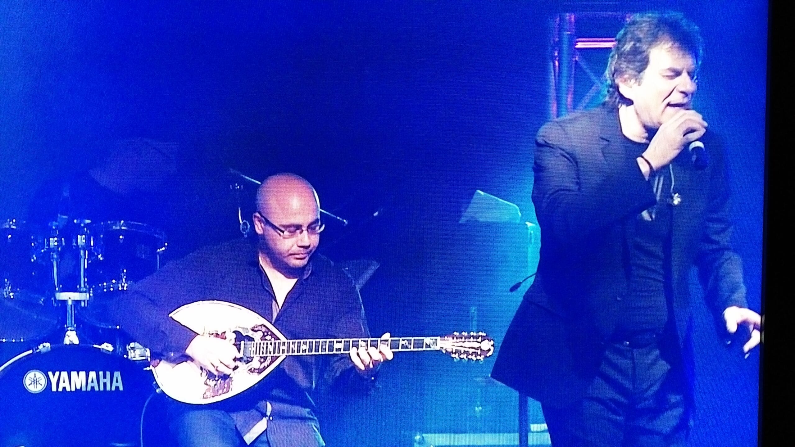 Greek Bouzouki Player Bobby Terzakis live on stage with Aggelos Dionisiou