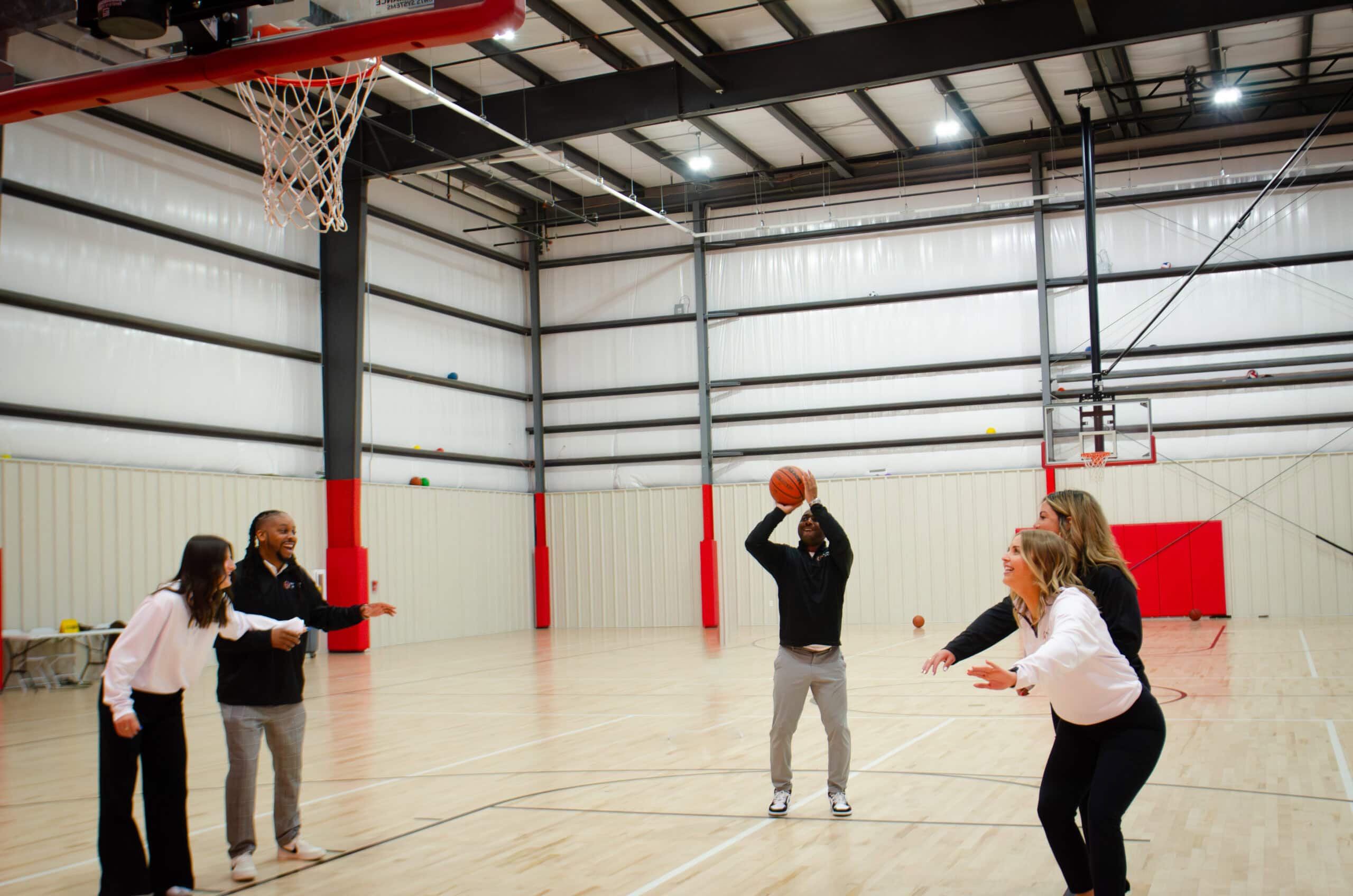 Hamilton Wealth Team Playing Basketball