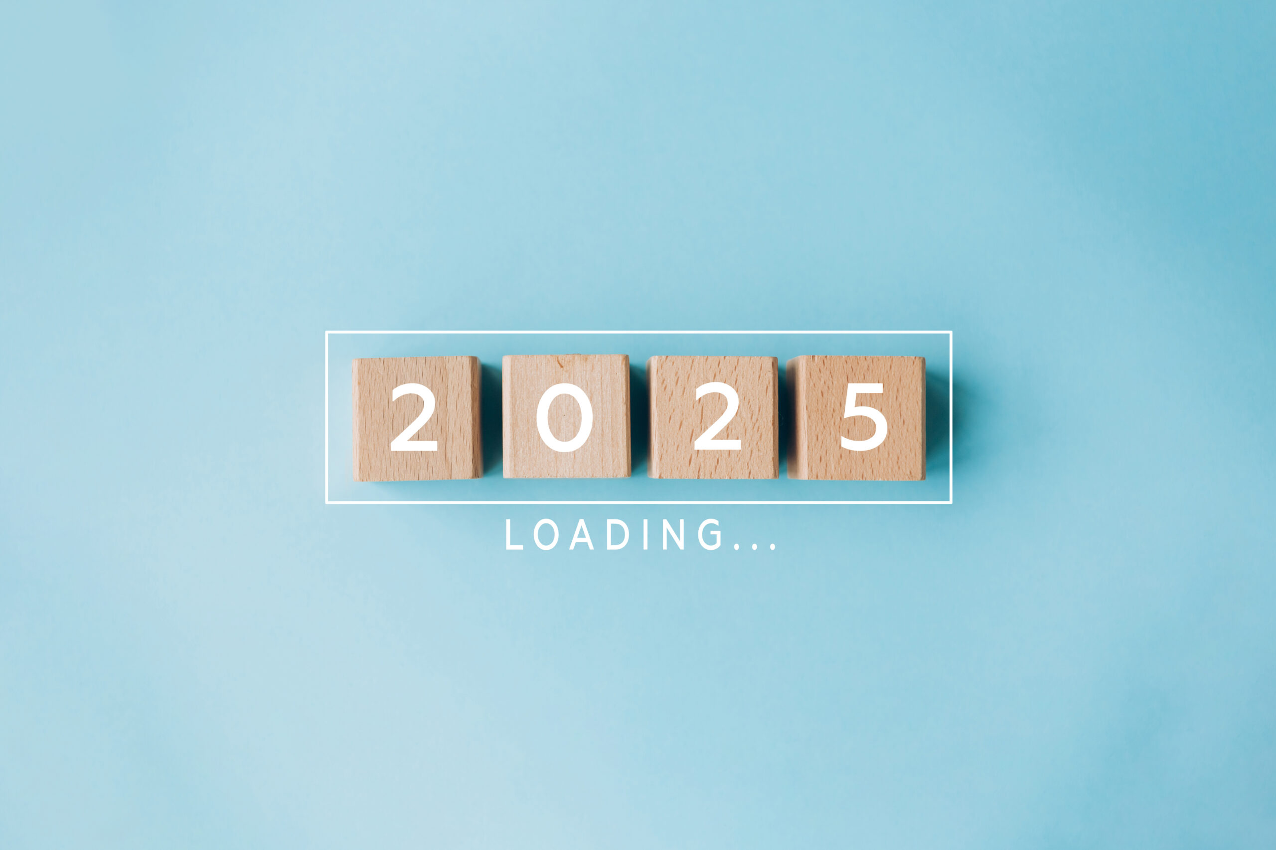 2025 New Year Loading. Loading bar with wooden blocks 2025 on blue background. Start new year 2025 with goal plan, goal concept, action plan, strategy, new year business vision. Check List