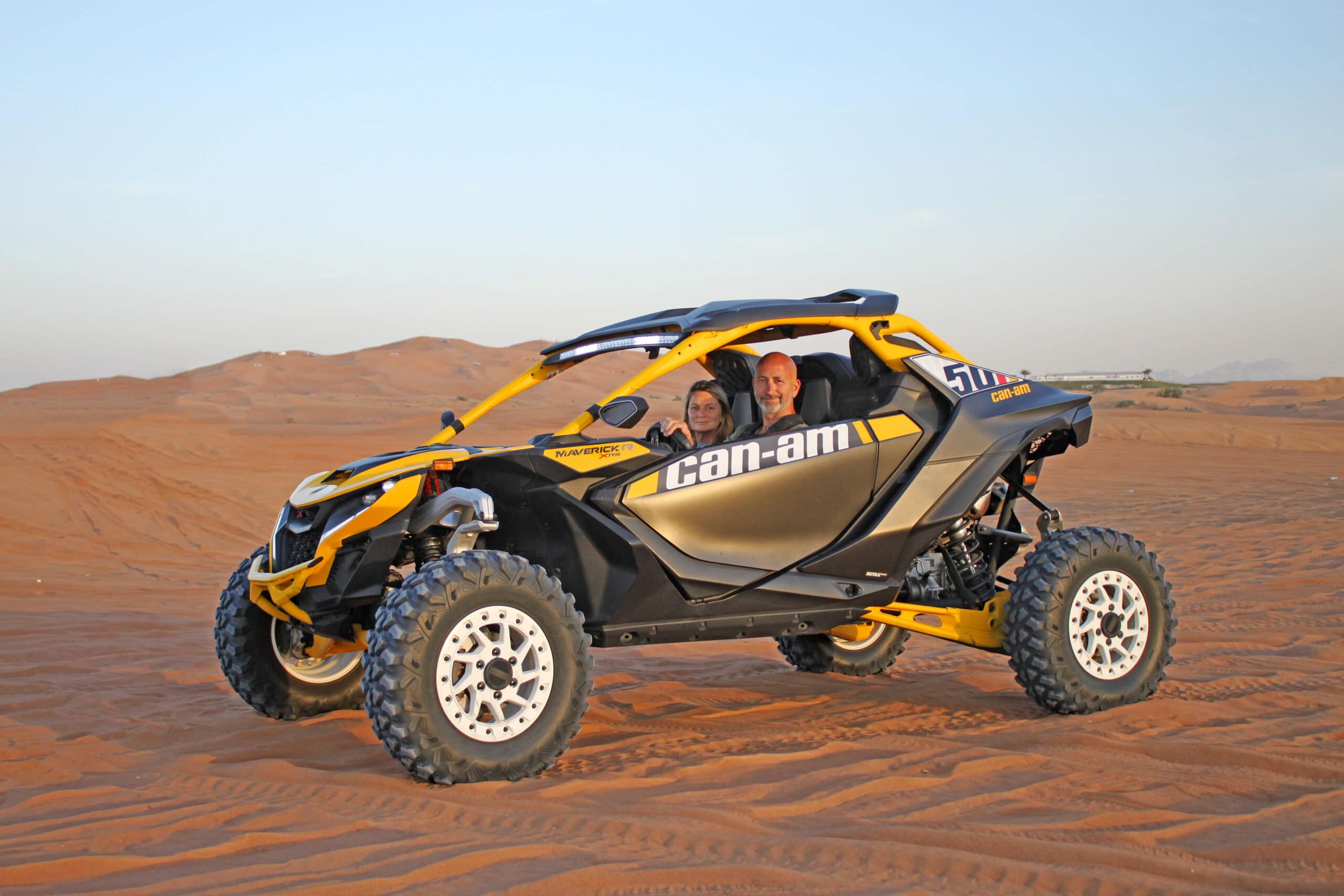 Can-Am vehicle on sandy terrain