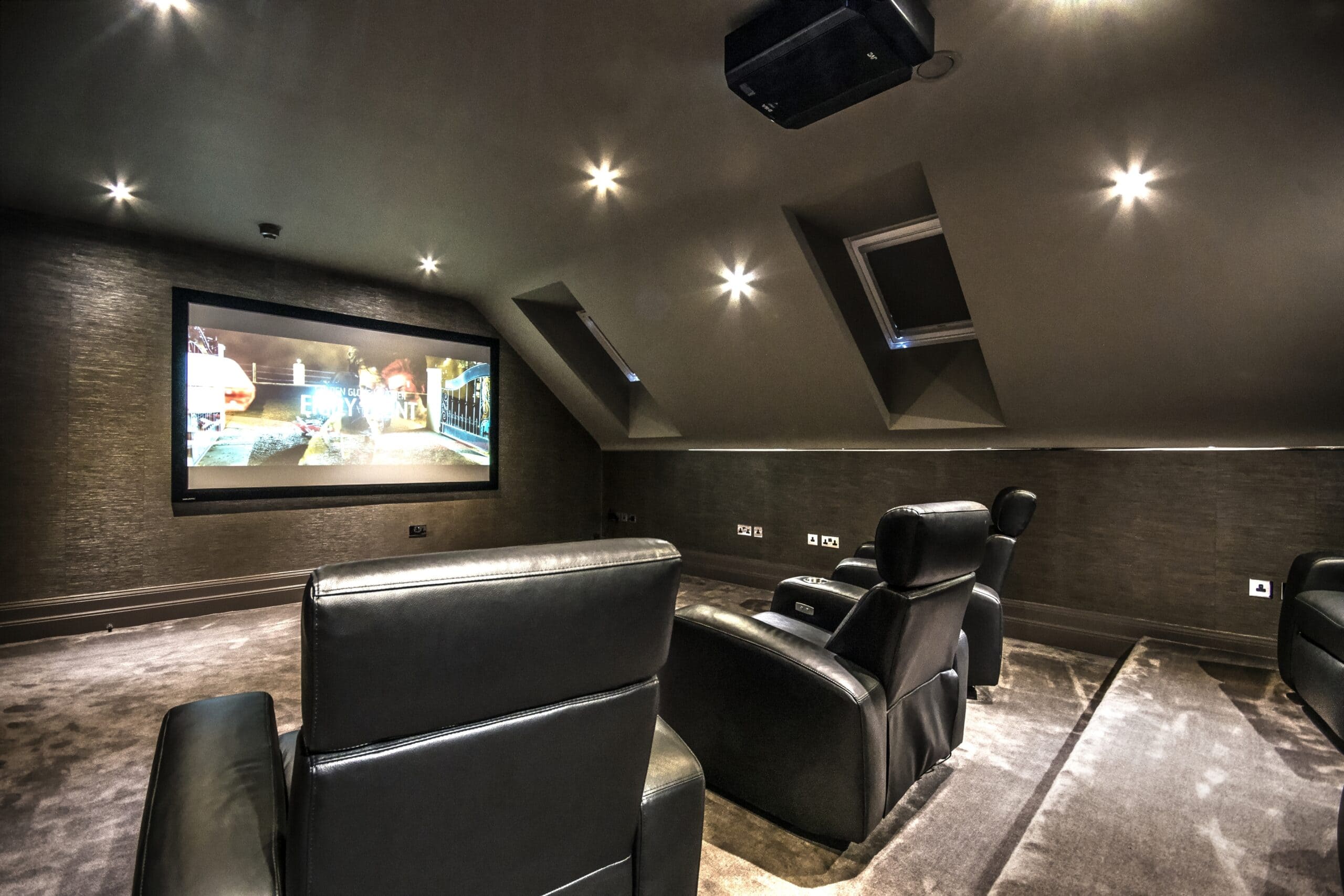 A luxury home cinema system built within a loft