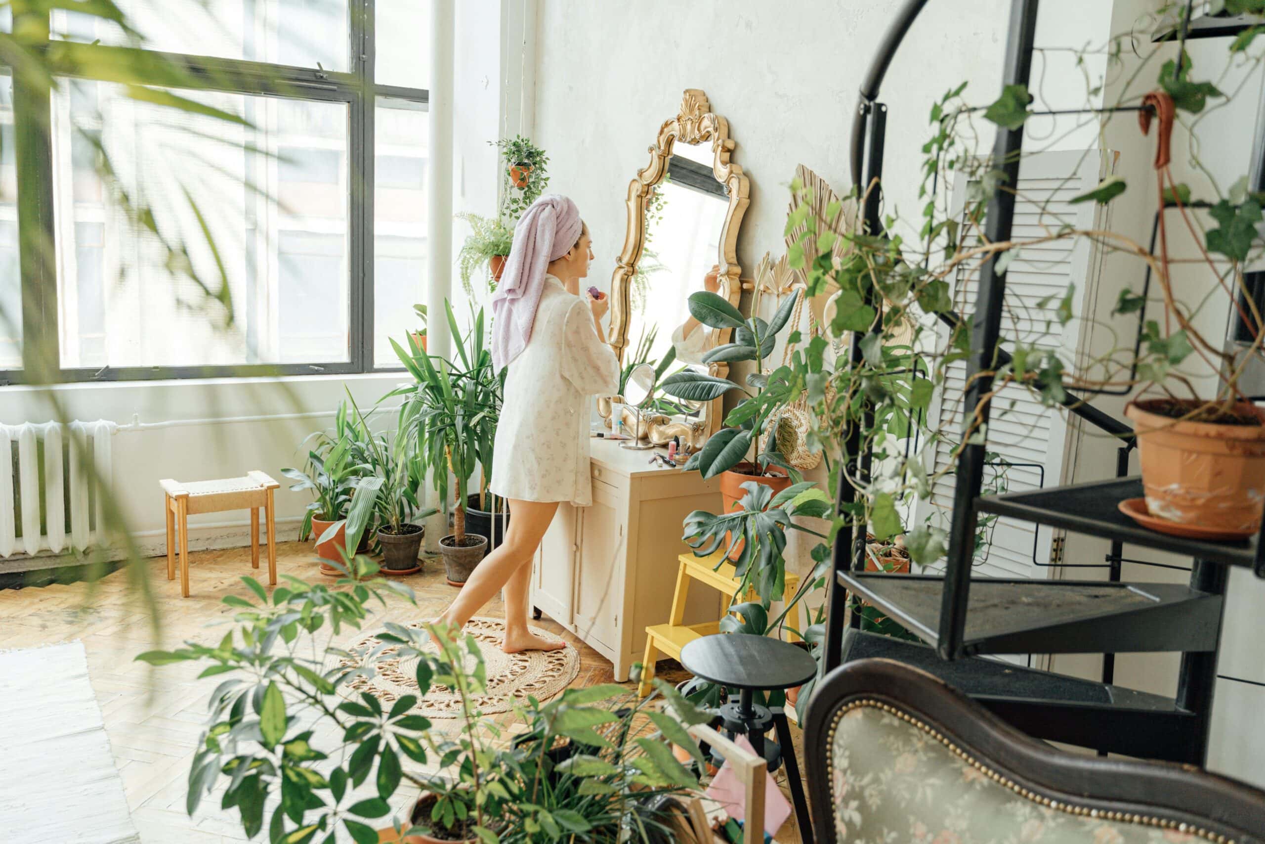 Woman surrounded by Houseplants