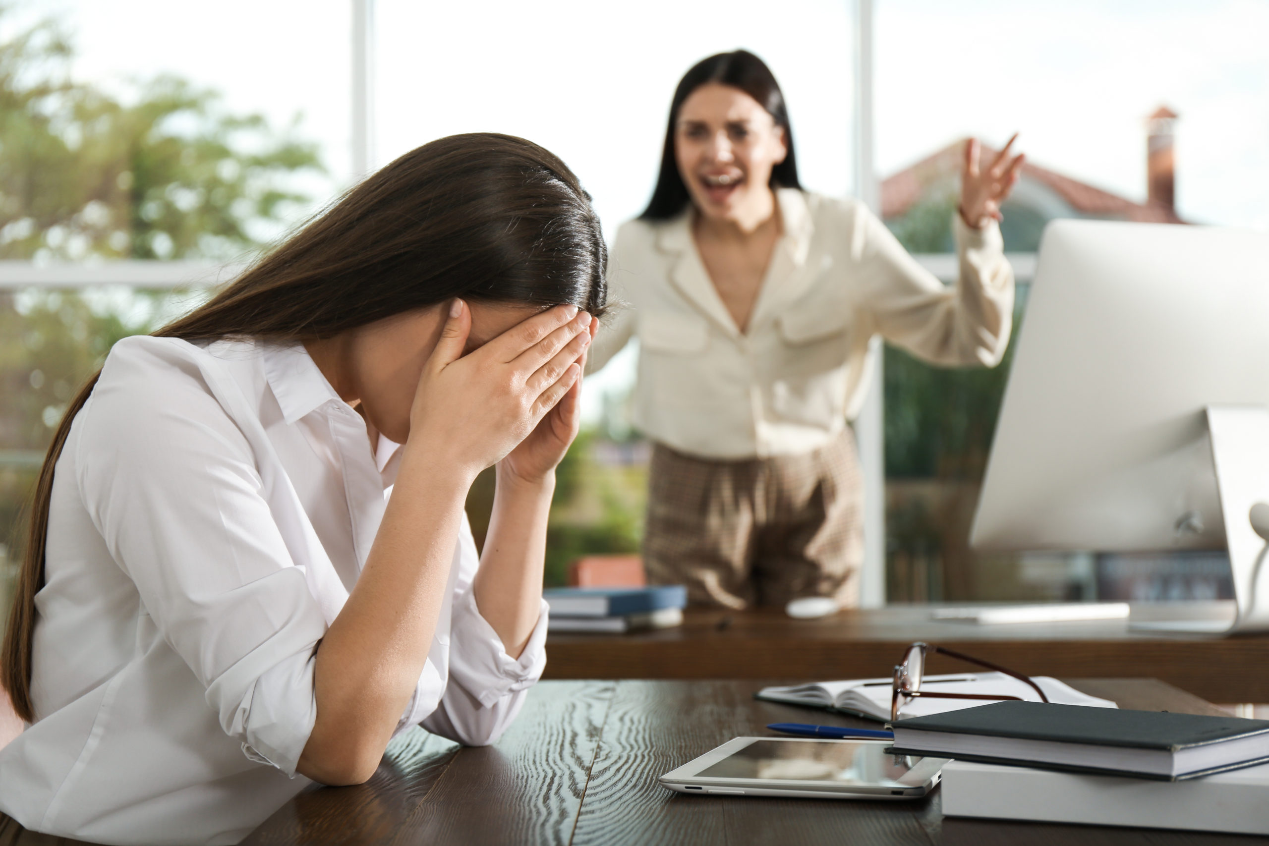 Boss screaming at employee in office. Toxic work environment | TimeWellScheduled
