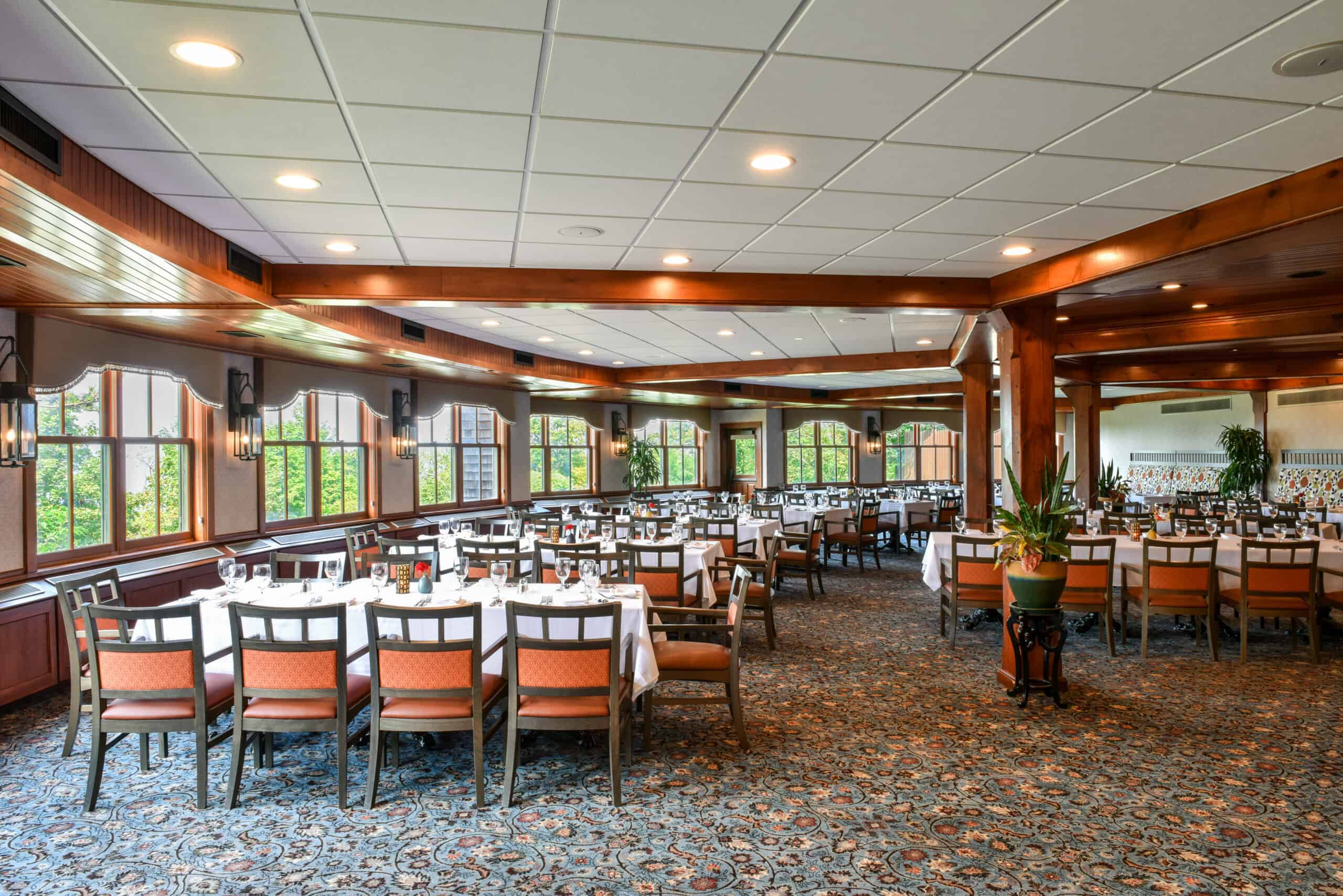 Large Naturally lit dining/meeting room with windows at our Upstate Ny resort
