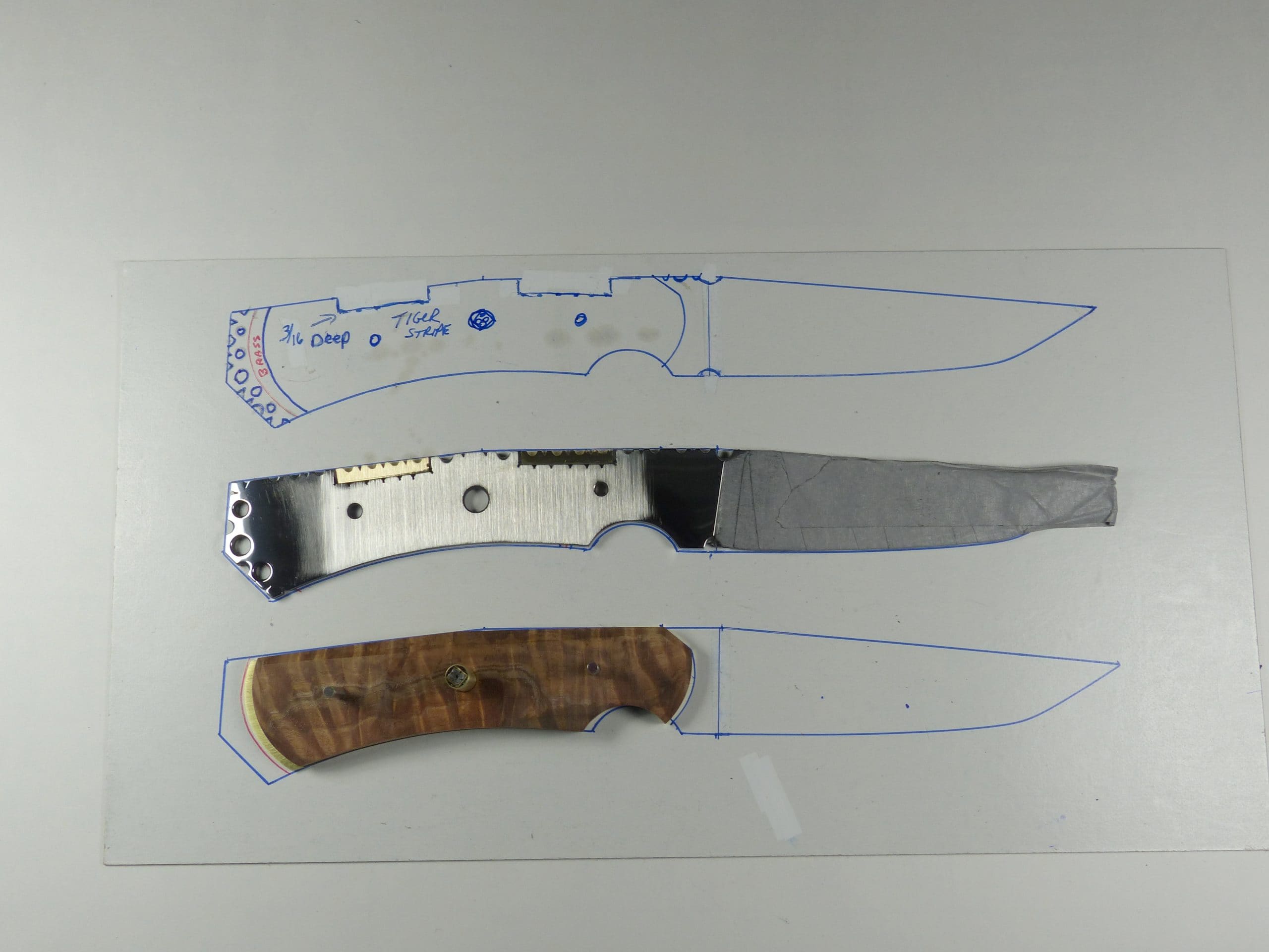 11 Side view of partially assembled knife and working drawing Side view of partially assembled knife and working drawing