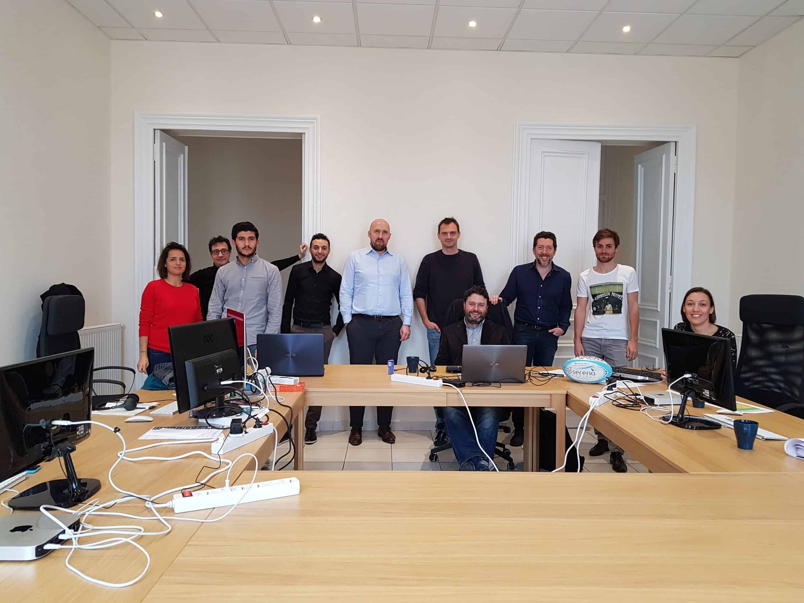 Team meeting in a modern office conference room at Quantilia.