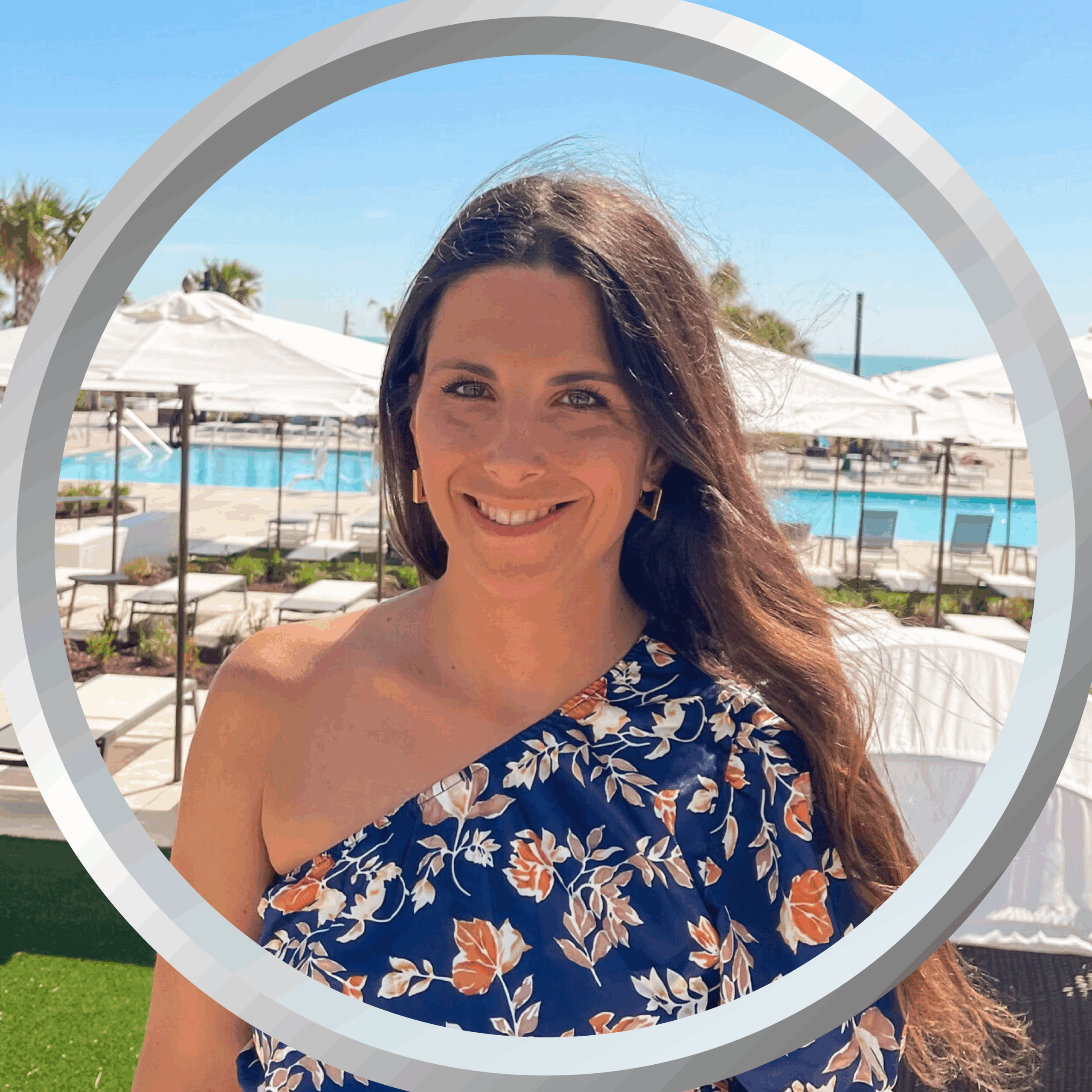 Relaxed woman enjoying sunny poolside at a luxurious resort in Florida.