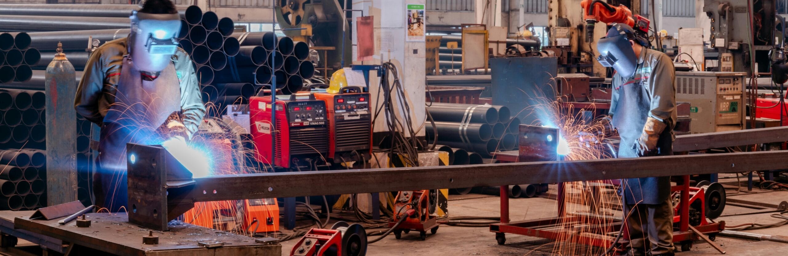 NDT services Guyana technician performing ultrasonic testing on a pipeline weld