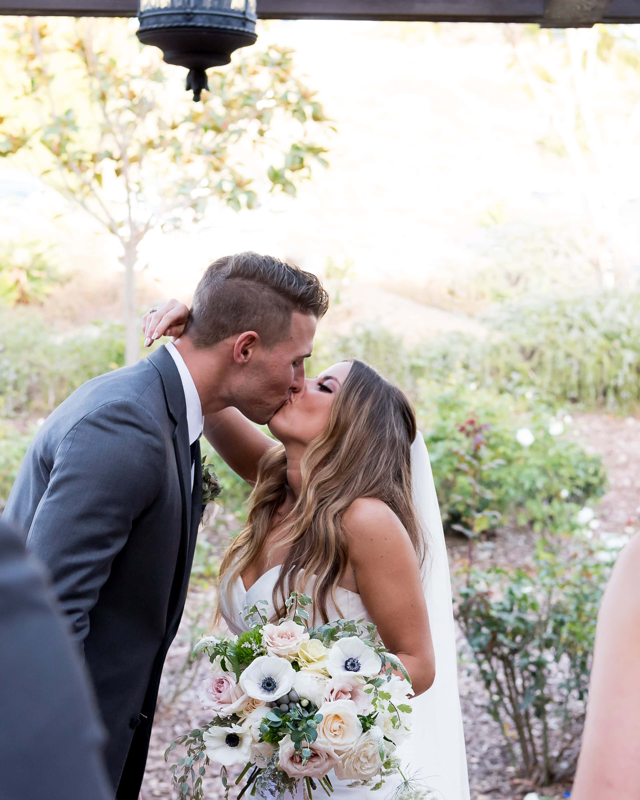 Orange County Wedding Photography Ca. Wedding day first kiss for this bride and groom