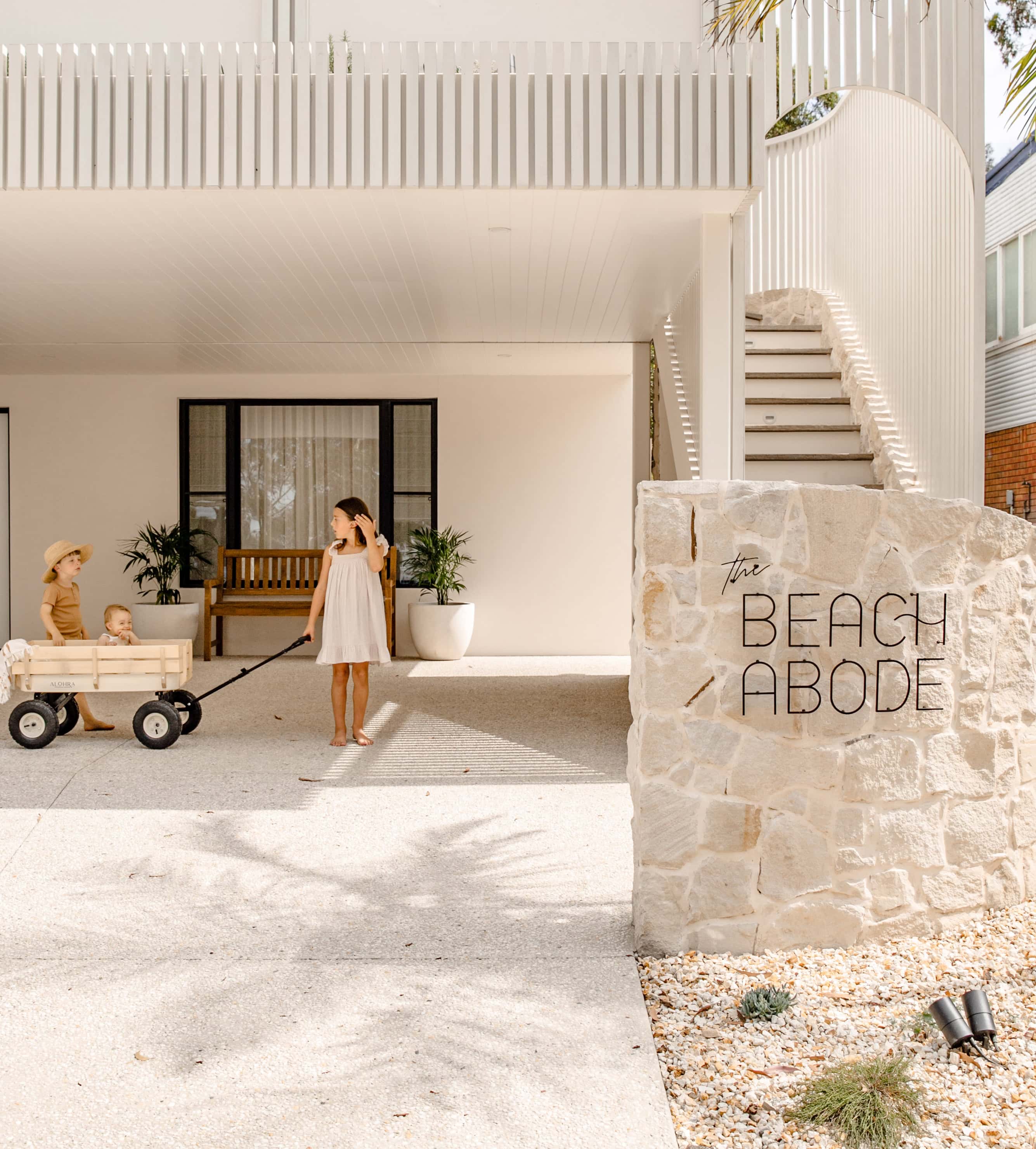 Foster irregular sandstone cladding exterior walls at Beach Abode