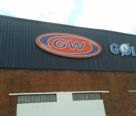 large oval light box on building