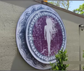 Round Lightbox Sign. Custom outdoor lightbox business sign.