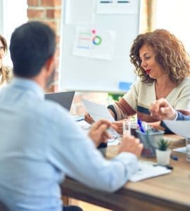 in-person meeting of a franchise leadership team