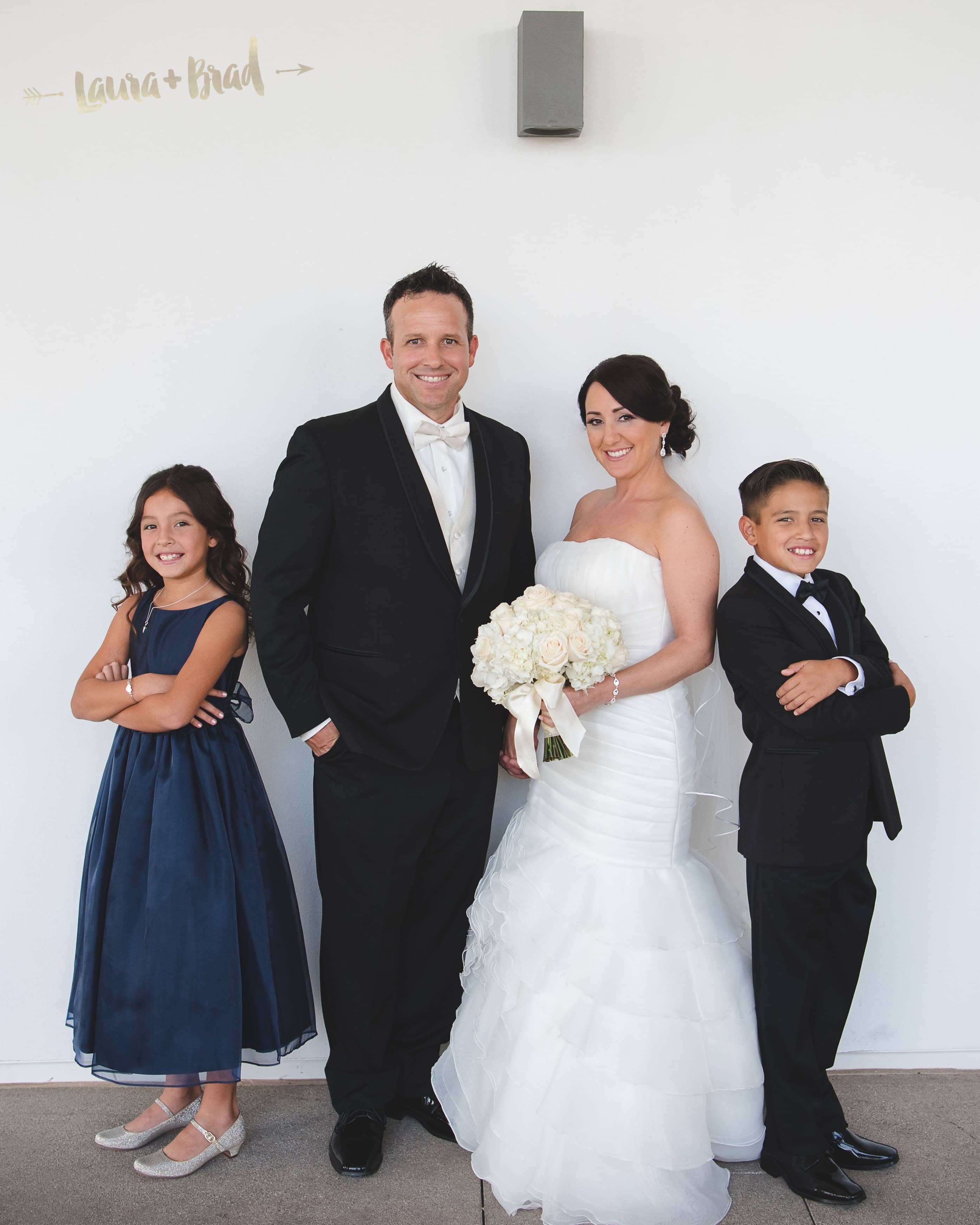 Bride and groom wedding day family photo fun 